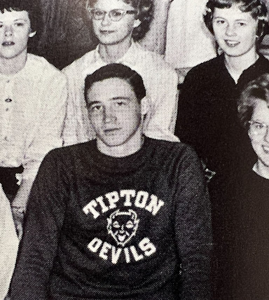 Gentleman wearing a Tipton Devils shirt with an old logo on it