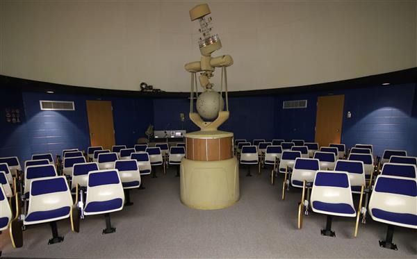 Frontal view of the planetarium at TCSC. It shows the projector and seating.