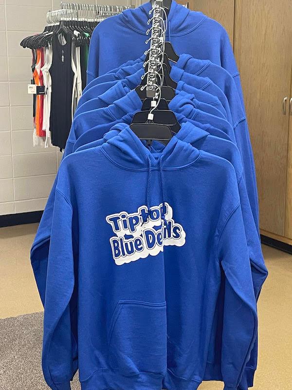 close-up photo of blue sweatshirt featuring Blue Devils wordmark in white font